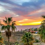 Weerbericht Tenerife - palmbomen en gekleurde wolken